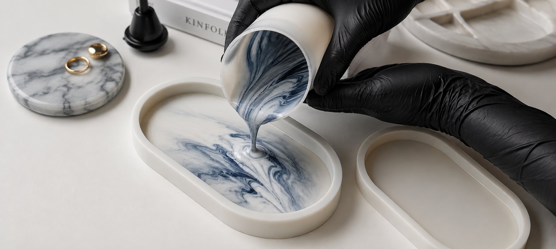 Water-based eco-resin being poured into a silicone mould in the workshop